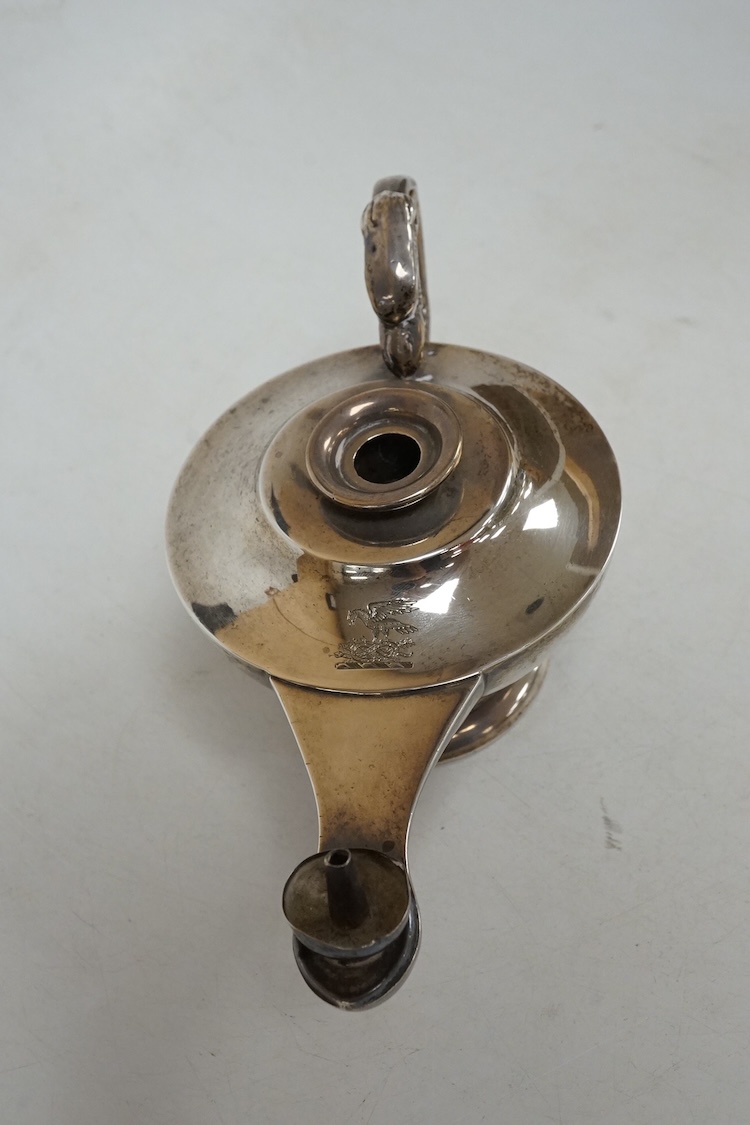 A George V Asprey & Co silver table lighter, modelled as an 'Aladdin' oil lamp, Birmingham, 1911, length 16cm, weighted.